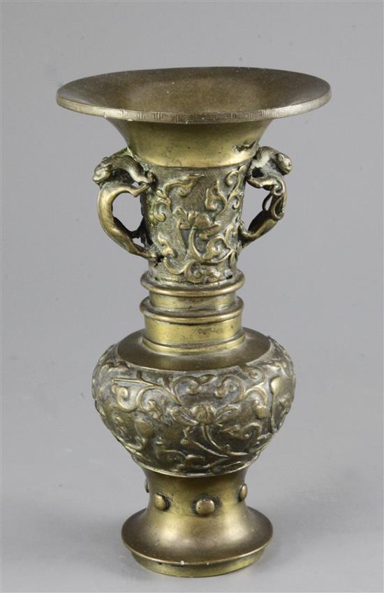 A Chinese or Japanese bronze beaker vase, gu, 17th / 18th century, 21.5cm, old repairs